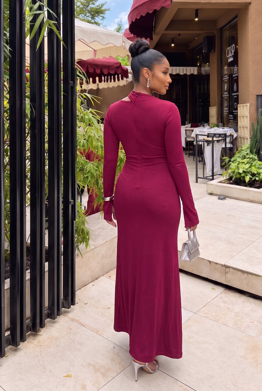 Change the model’s pose to an elegant back view, showing the back of the dress clearly. The model should stand naturally with a graceful posture, slightly turning her head to the side. Highlight the back design, fit, fabric, and silhouette of the dress. Preserve the exact original dress, model identity, hairstyle, body proportions, background, image quality, sharpness, resolution, lighting, and original colors. Do not modify or redesign the garment. Keep the same photorealistic quality and color grading. Ch